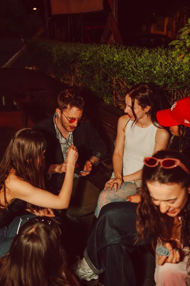 Friends out on a pub terrace at night