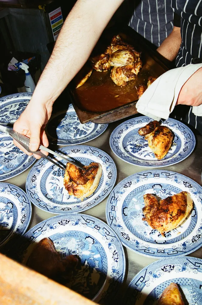 Plates being dressed for a supper club